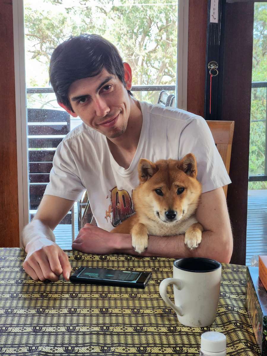 A photo of me with my dog, Aiko